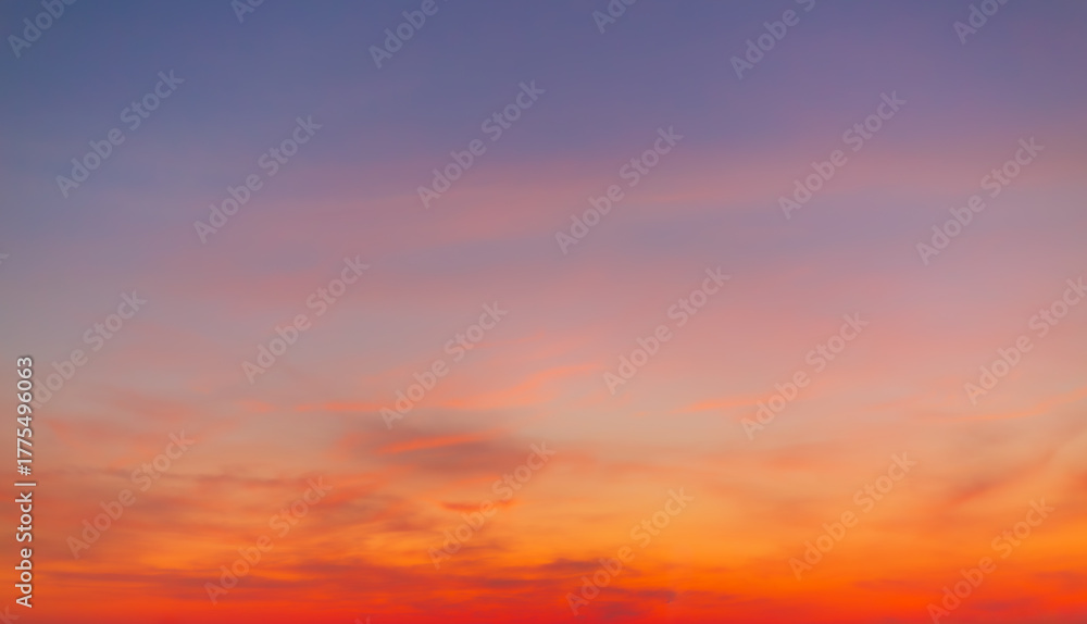 Fototapeta premium Clouds and sky backdrop at sunrise and sunset,Sunrise background. Dramatic majestic scenery sunset. Sky with clouds in Sunrise sky light background. Sunrise with clouds in various shapes.