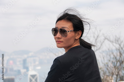 chinese woman on top of victoria peak hong kong