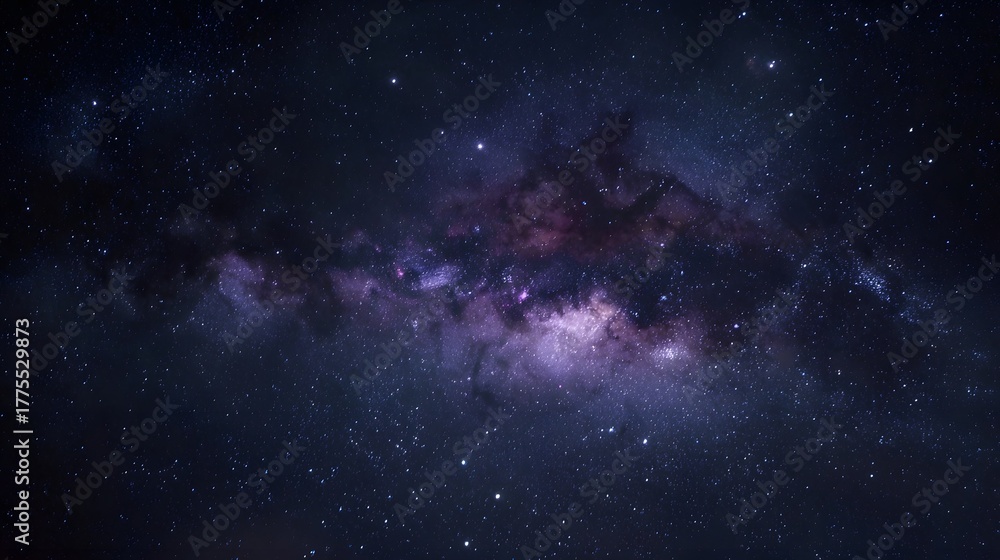 Obraz premium Expansive view of the vibrant Milky Way galaxy stretching across the dark night sky filled with countless stars and colorful nebulae