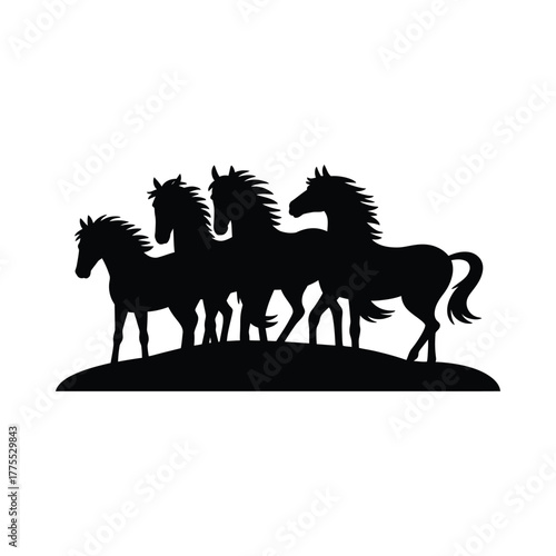 Silhouette of a herd of horses running across a hill