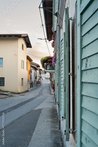 Quaint European Alley with Green Shutters at Dusk