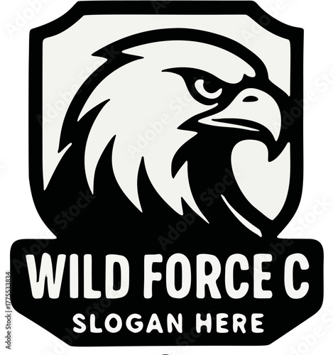 Graphic emblem featuring an eagle head inside a shield, with text "WILD FORCE C" and "SLOGAN HERE" below.