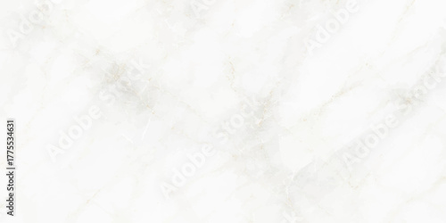 Fluffy cotton materials on a textured white paper surface create a soft, winter-like pattern