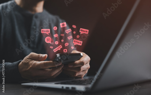 A man holding a smartphone with toxic online messages representing cyberbullying, digital harassment, and social media abuse in modern internet culture.