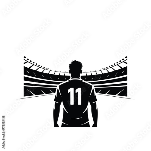 Soccer player with number 11 jersey facing stadium stands silhouette