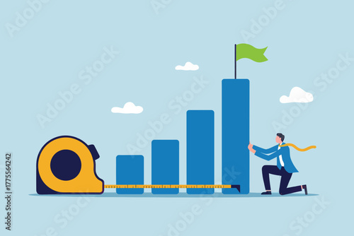 Business growth measurement and success strategy concept with measuring tape and tall bar chart featuring a person and flag symbolizing achievement