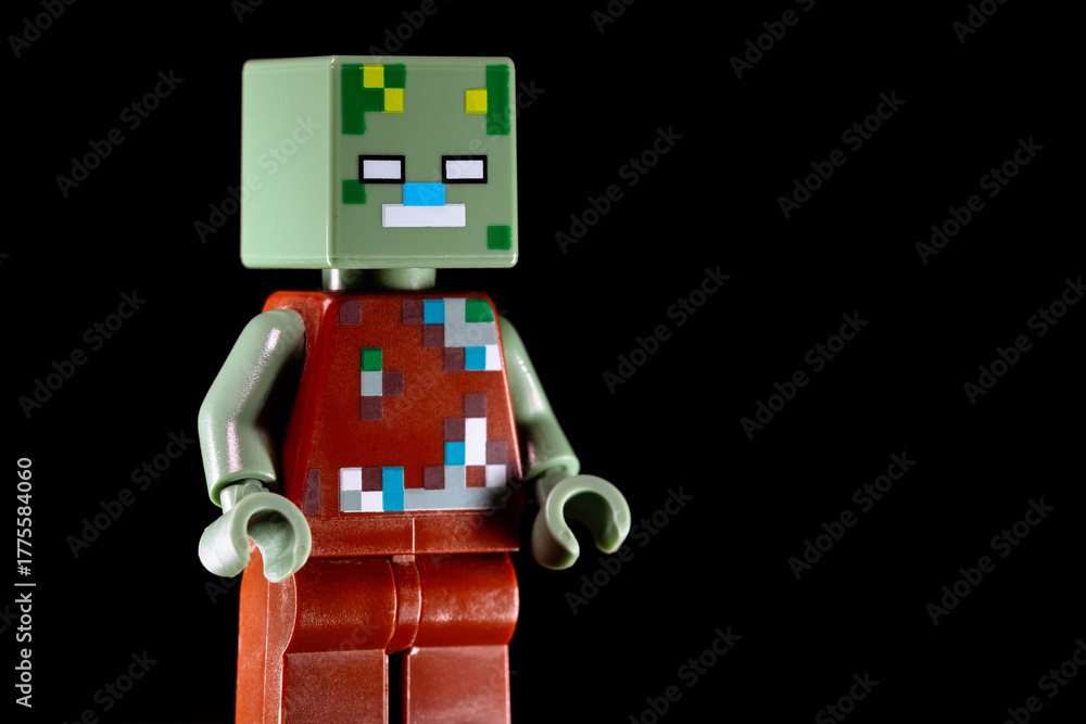 Fototapeta premium LEGO Minecraft Drowned standing sideways on a black background