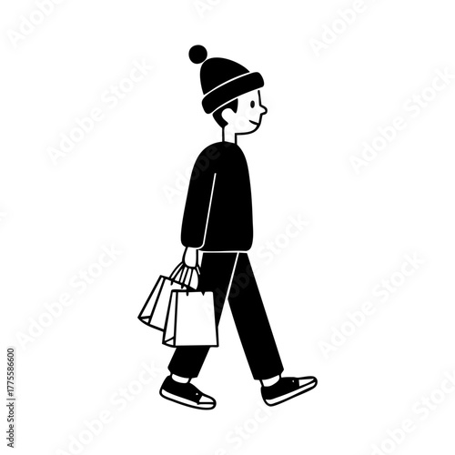 Young person walking with shopping bags in hand, capturing the mood of winter holiday shopping and seasonal consumerism.
