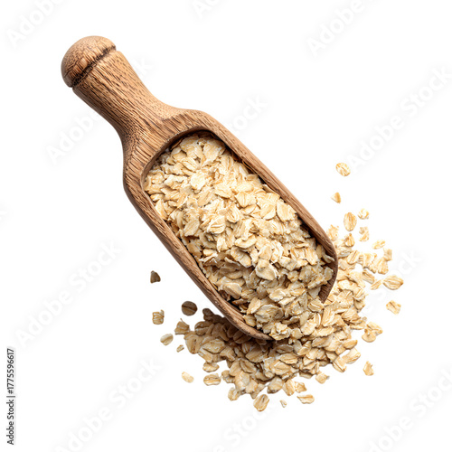 Rolled oats spilling from a wooden scoop against a stark view on transparent background