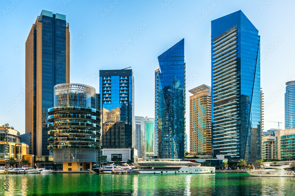Fototapeta premium Dubai Marina modern skyscrapers at sunny day. Dubai, United Arab Emirates.