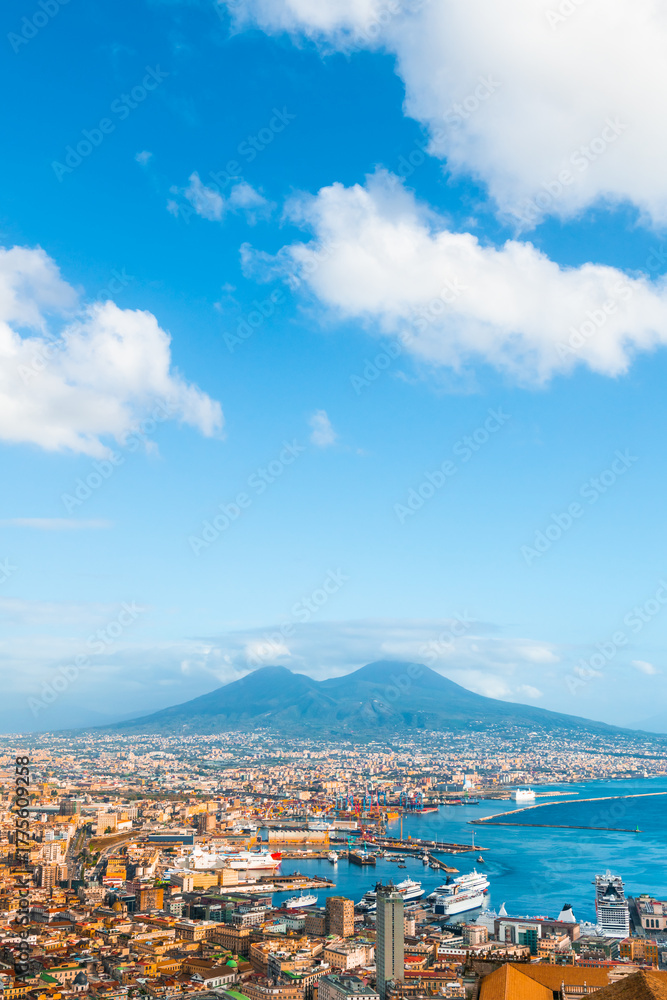 Fototapeta premium Panoramic view of Naples city and Gulf of Naples, Italy. Vesuvius volcano in the background.