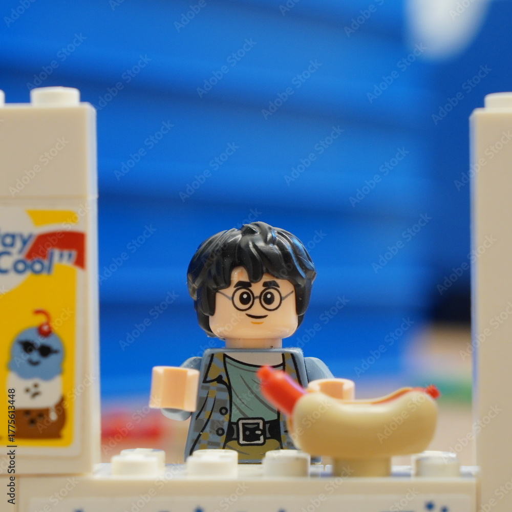 Naklejka premium LEGO Harry Potter Holding Hot Dog Playful Scene with Miniature Figures and Food