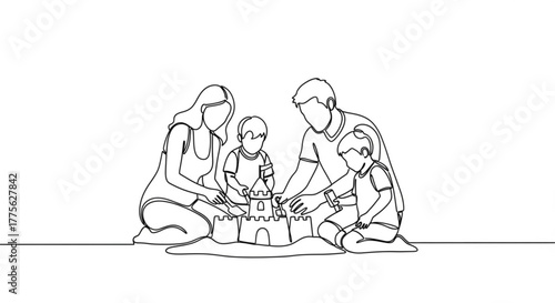 Family building sandcastle together on the beach in summer  