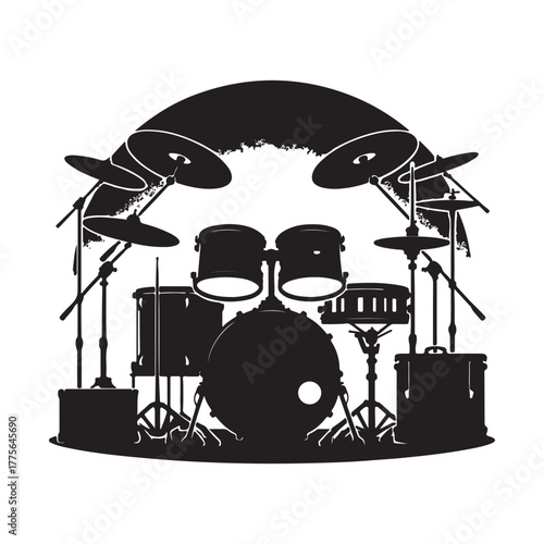 Drum set stands center stage in a dimly lit room, 