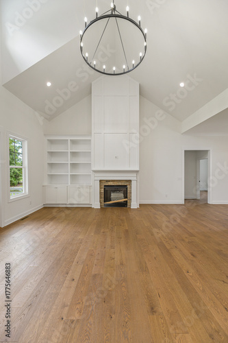 Interior vaulted ceiling of a vacant empty new house. 