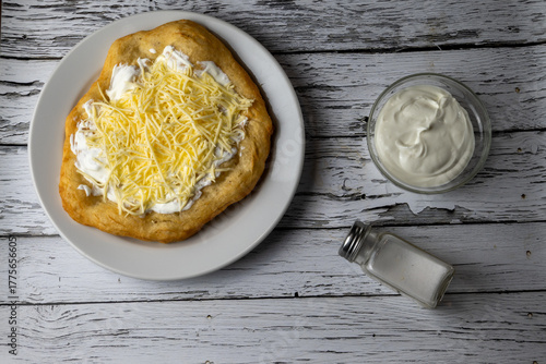Canvas Print Hungarian classic street food - deep fried flatbread, lángos