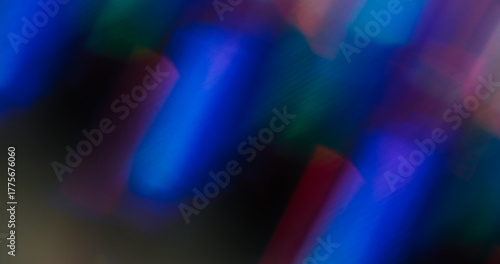 Colorful glow blur. Neon leak. Purple blue crystal reflection luminosity prism with fluorescent twinkle blending on black background.
