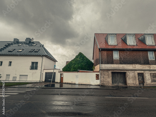 Gloomy European Street Scene with Weathered Buildings and Ivy