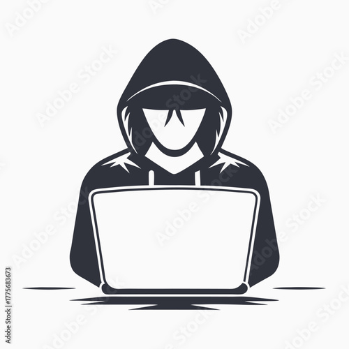 Faceless hooded silhouette using laptop communicates digital anonymity and internet security today effectively