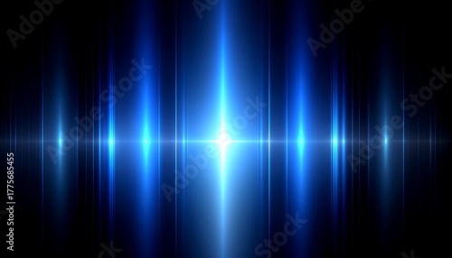 Abstract blue light streaks and flares emanating from a central point on a black background
