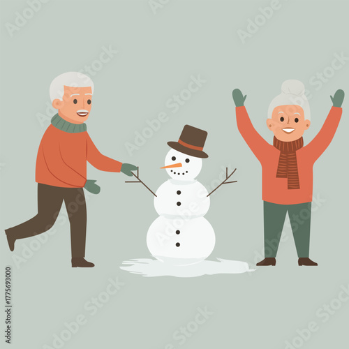  A happy elderly man and woman built a snowman.