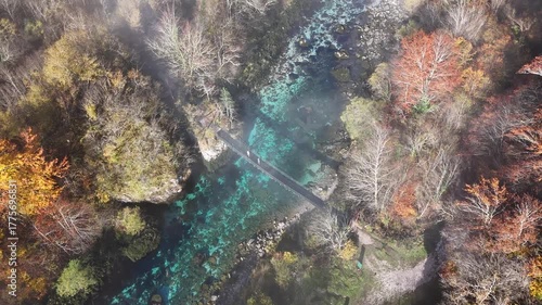 Stunning aerial drone footage of the Piva River and canyon in Montenegro. The video captures the breathtaking turquoise-blue water
