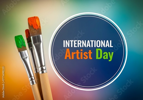 Three paintbrushes with vibrant paint for international artist day celebration