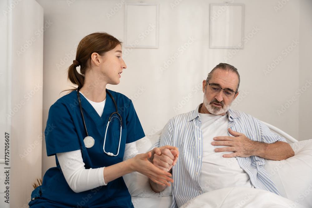 Obraz premium Home healthcare service for seniors with female nurse checking elderly man's heartbeat using stethoscope. Ideal for medical care, elder support, home visit, and heart health visuals.