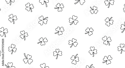 Delicate seamless pattern of scattered shamrock leaves, symbolizing luck, nature, and the festive spirit of St. Patrick's Day.