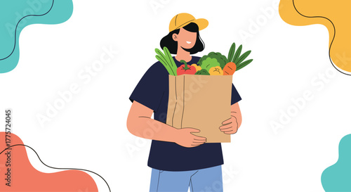 Smiling woman wearing a yellow cap, happily holding a paper bag overflowing with fresh, colorful vegetables after a grocery trip.