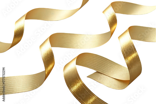 Multiple flowing golden ribbons. Abstract decorative background with festive textured fabric streamers. Luxury shimmering elements for celebration or holiday.