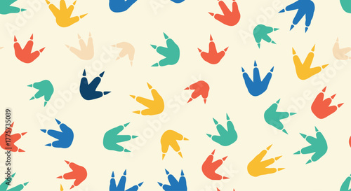 Colorful and playful seamless pattern of various dinosaur footprints scattered across a light beige background, perfect for kids.