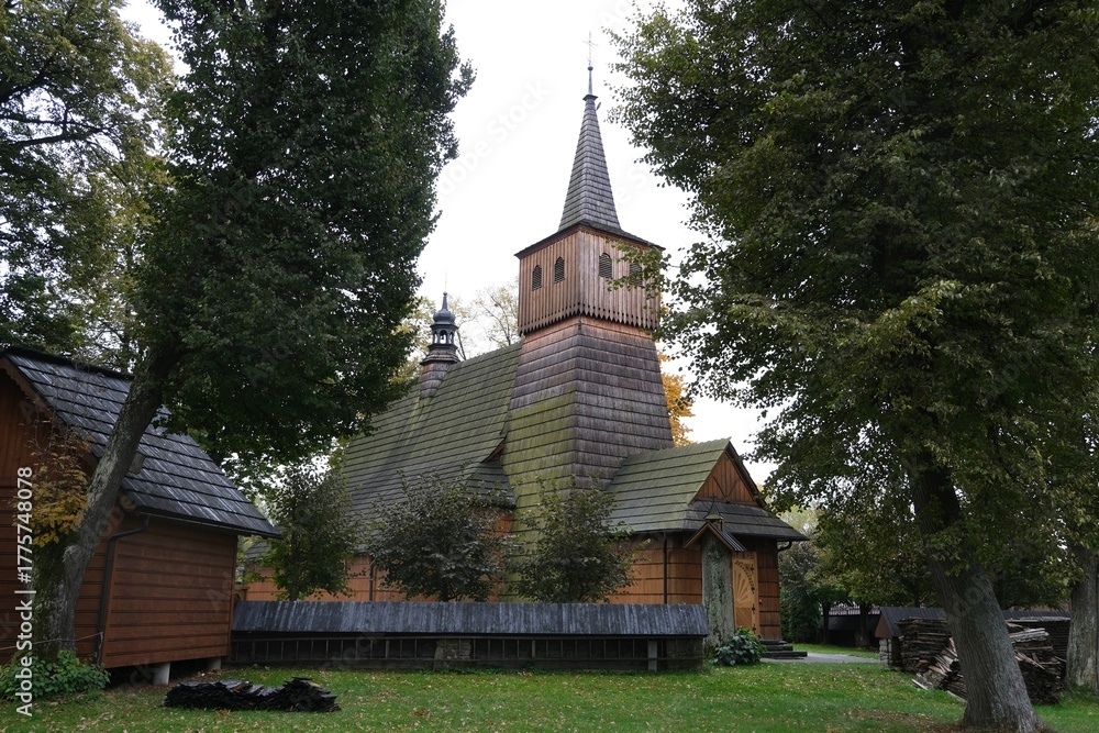 Naklejka premium Historic wooden church of the Holy Trinity and St. Anthony the Abbot in Lopuszna, Poland. Church is part of Wooden Architecture Trail in Malopolska.