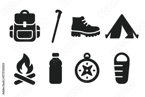 Mountain Hiking Essentials. Solid style icons of Mountain Hiking: Backpack, Walking Stick, Hiking Boots, Tent, Campfire, Water