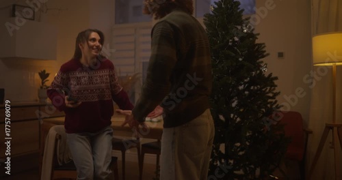 Wallpaper Mural Gathering with friends during winter evening at home while decorating Christmas tree Torontodigital.ca