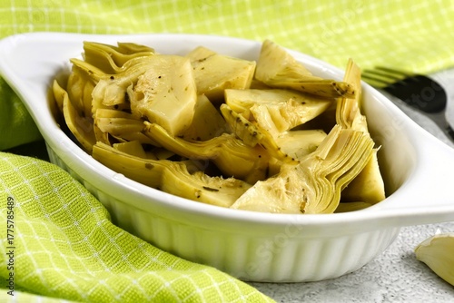 Artichokes in sunflower oil vinegar with garlic. Cynara cardunculus.