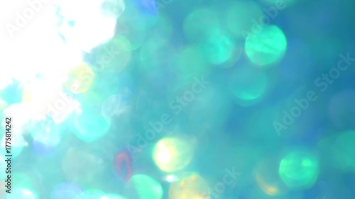 Sparkling Blue Texture. Christmas and New Year glitter bokeh Wallpaper.Winter sparkling background. 4k footage