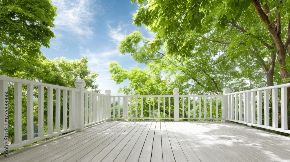 Obraz premium Sunlit Deck View: Tranquil Outdoor Space with Greenery and Blue Sky, Ideal for Relaxation and Nature
