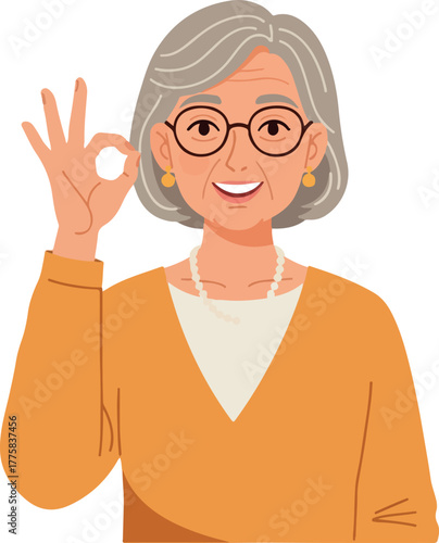 Elderly Woman Wearing Glasses and Orange Sweater Showing OK Sign