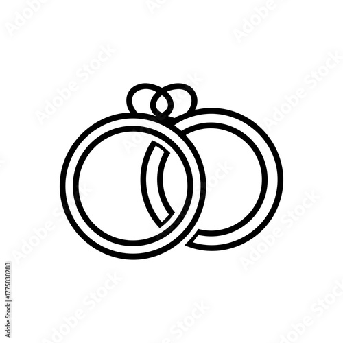 Two wedding rings tied together with a ribbon