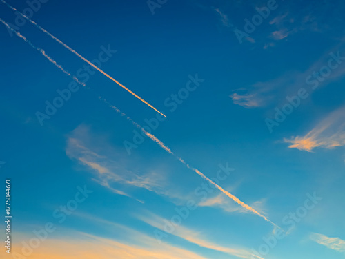 Aeroplane Trails Over a Blue Sky