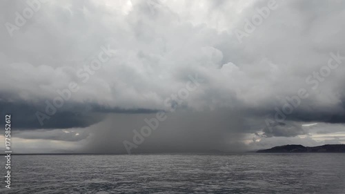 Heavy rain falls on a region in the Aegean Sea before a storm	

