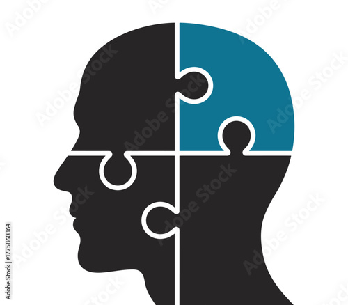 Silhouette of a human head made of puzzle pieces, representing the mind and intellect