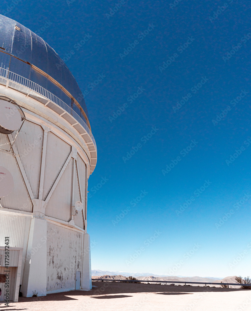 Fototapeta premium Astronomical observatory under clear blue sky in Cerro Tololo, northern Chile