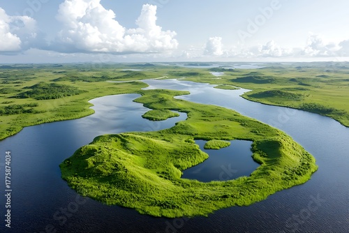 Scenic Aerial View of Lush Green Island Surrounded by Calm Blue Water and Cloudy Sky