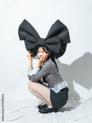 Fashion portrait of young Asian woman. 