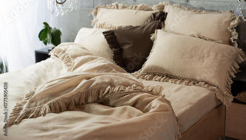 Fotografija cozy pillows on a double bed for background