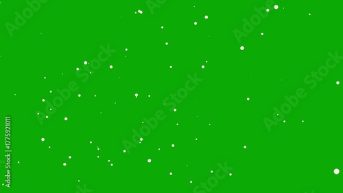 Dust particals flying against green background. Snowflakes overlay isolated on chroma key footage, Abstract Fire Particles Animated Background. abstract dust fail video with green background