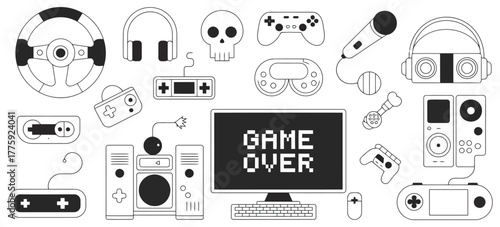 Collection of gaming-related items including controllers, headphones, speakers, and a computer screen