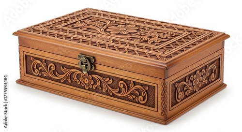 A beautifully carved wooden box with intricate floral patterns and a metal clasp.